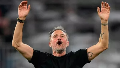 PSG's head coach Luis Enrique celebrates after the Champions League semifinal second leg soccer match between Bayern Munich and Paris Saint Germain in Munich, Germany, Wednesday, May 6, 2026. (AP Photo/Martin Meissner)