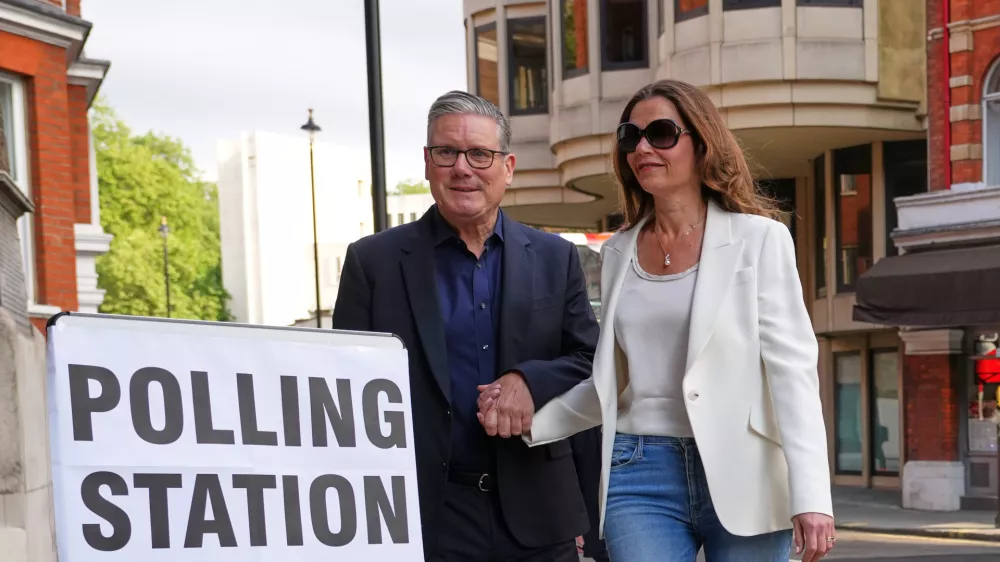 Britain's Prime Minister Keir Starmer and wife Victoria arrive at a polling station in central London, Thursday, May 7, 2026 to cast their votes in the local elections.(AP Photo/Kirsty Wigglesworth)