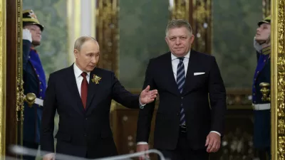 Russian President Vladimir Putin shows the way to Slovak Prime Minister Robert Fico during a meeting in Moscow, Russia May 9, 2026. REUTERS/Ramil Sitdikov/Pool   TPX IMAGES OF THE DAY