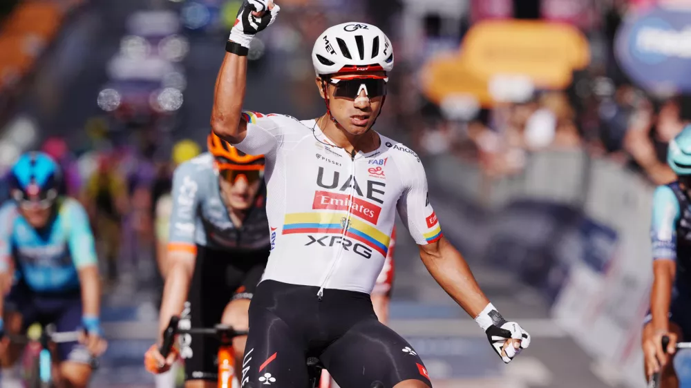 Ecuador's Manuel Jhonatan Narvaez celebrates winning the 4th stage of the Giro d'Italia cycling race, from Catanzaro to Cosenza, Italy, Tuesday, May 12, 2026. (Gian Mattia d'Alberto/LaPresse via AP)