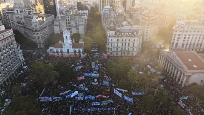 People protest to demand more fundings for public universities in Buenos Aires, Argentina, Tuesday, May 12, 2026. (AP Photo/Rodrigo Abd)