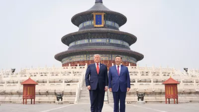President Donald Trump, right, stands with Chinese President Xi Jinping at the Temple of Heaven on Thursday May 14, 2026, in Beijing. (AP Photo/Mark Schiefelbein)