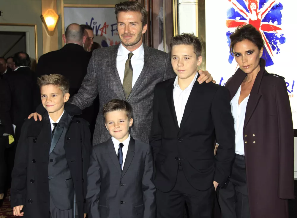 The Beckham family arrive for Viva Forever! Press Night, a musical based on the songs of the Spice Girls, at the Piccadilly Theatre in central London, Tuesday, Dec. 11, 2012. (Photo by Joel Ryan/Invision/AP)