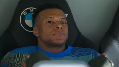 Real Madrid's Kylian Mbappe looks out from the bench prior to the Spanish La Liga soccer match between Real Madrid and Real Oviedo in Madrid, Spain, Thursday, May 14, 2026. (AP Photo/Manu Fernandez)