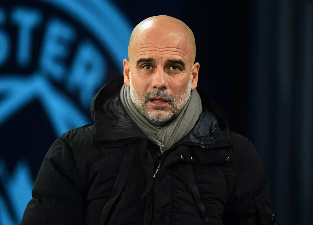 FILE PHOTO: Soccer Football - FA Cup - Third Round - Manchester City v Salford City - Etihad Stadium, Manchester, Britain - January 11, 2025 Manchester City manager Pep Guardiola before the match REUTERS/Peter Powell/File Photo / Foto: Peter Powell