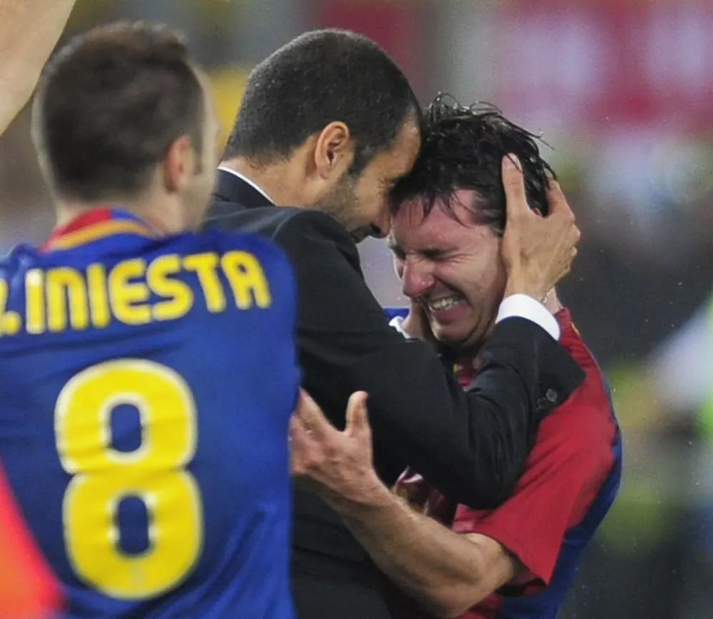 Pep Guardiola in Lionel Messi maja 2009 / Foto: AP