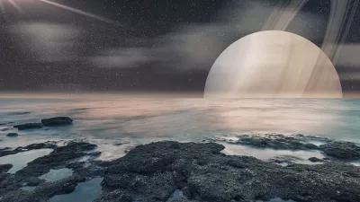 Pogled na Saturn s Titana, kot si ga je predstavljal umetnik. / Foto: Istock