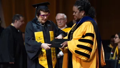 Tennis legend Billie Jean King, left, receives her diploma from California State University, Los Angeles, President Berenecea Johnson Eanes during commencement in Los Angeles, Monday, May 18, 2026. (AP Photo/Jae C. Hong)