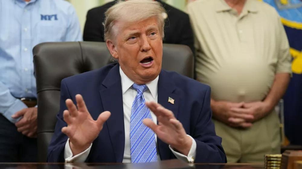 President Donald Trump speaks during an event about loosening a federal refrigerant rule, in the Oval Office at the White House, Thursday, May 21, 2026, in Washington. (AP Photo/Jacquelyn Martin)