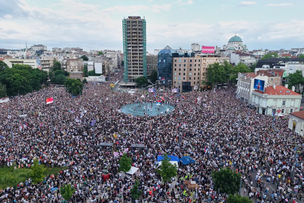 Anti-government protesters take part in a rally led by Serbia's protesting university students who are pushing for major political changes in the Balkan country run by President Aleksandar Vucic, in Belgrade, Serbia, Saturday, May. 23, 2026. (AP Photo/Armin Durgut)