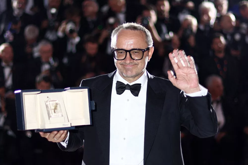 Director Andrey Zvyagintsev, Grand Prix award winner for the film "Minotaur" (Minotaure), poses during a photocall after the closing ceremony of the 79th Cannes Film Festival in Cannes, France, May 23, 2026. REUTERS/Gonzalo Fuentes REFILE - ADDING BYLINE