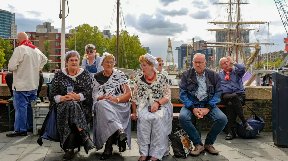 Rotterdam, the Netherlands - September 8, 2019: Women in traditional Dutch clothes in the Leuvehaven during the celebration of the World Port Days