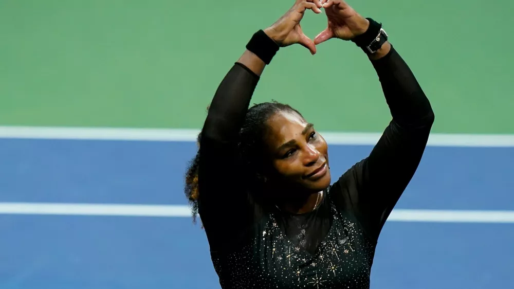 FILE - Serena Williams motions a heart to fans during the third round of the U.S. Open tennis championships, Sept. 2, 2022, in New York. (AP Photo/Frank Franklin II, file)