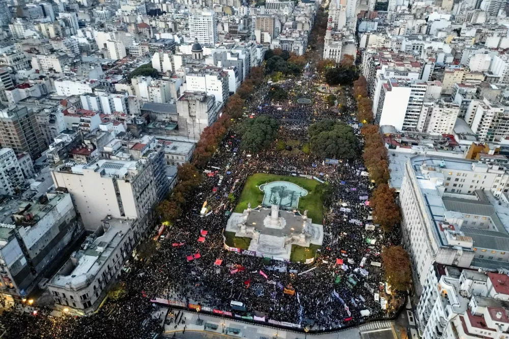 A drone view of members of the women's movement "Ni Una Menos" (Not one (woman) less) protesting amid public outrage following the femicide of 14-year-old Agostina Vega in Cordoba province, outside the National Congress, in Buenos Aires, Argentina, June 3, 2026. REUTERS/Cristina Sille   TPX IMAGES OF THE DAY