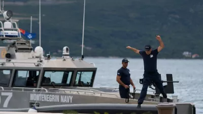 A Montenegrin navy sailor jumps from a boat after a patrol ahead of the EU-Western Balkans summit in Tivat, Montenegro, June 4, 2026. REUTERS/Stevo Vasiljevic