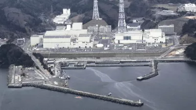 An aerial view shows Onagawa Nuclear Power Plant is seen at Miyagi Prefecture in this photo taken by Yomiuri Shimbun on April 8, 2011. Water leaked out of spent fuel pools at the Onagawa nuclear plant in northeast Japan after a strong aftershock rocked the region late on Thursday, but there was no change in the radiation levels outside the plant, operator Tohoku Electric Power said on Friday. Mandatory credit REUTERS/Yomiuri Shimbun (JAPAN - Tags: DISASTER ENERGY ENVIRONMENT) JAPAN OUT. NO COMMERCIAL OR EDITORIAL SALES IN JAPAN. FOR EDITORIAL USE ONLY. NOT FOR SALE FOR MARKETING OR ADVERTISING CAMPAIGNS. THIS IMAGE HAS BEEN SUPPLIED BY A THIRD PARTY. IT IS DISTRIBUTED, EXACTLY AS RECEIVED BY REUTERS, AS A SERVICE TO CLIENTS. YES