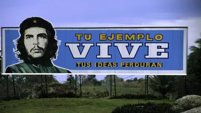 Plakat na Kubi, ki pravi: Tvoj zgled živi, tvoje ideje ostajajo. / Foto: Profimedia