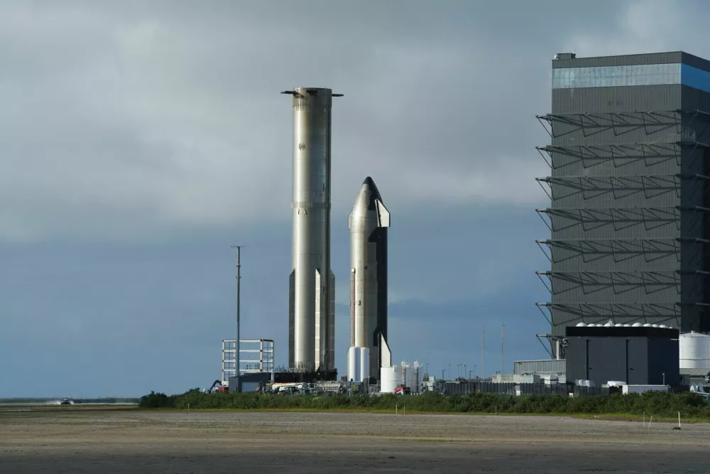 A general view of a SpaceX building and Starship rocket ahead of the SpaceX initial public offering (IPO), in Starbase, Texas, U.S., June 11, 2026.  REUTERS/Gabriel V. Cardenas
