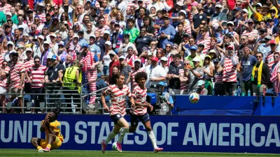 Australia's Nestory Irankunda fans to the ground after being fouled during the World Cup Group D soccer match between the United States and Australia in Seattle, Friday, June 19, 2026. (AP Photo/Lindsey Wasson)