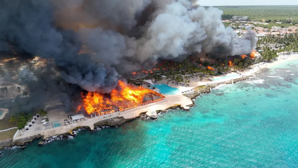 A drone view shows a fire at the Viva Wyndham Dominicus Beach Hotel in Bayahibe, La Altagracia, Dominican Republic, June 19, 2026 in this screen grab obtained from social media video. Gojko Culibrk/via REUTERS THIS IMAGE HAS BEEN SUPPLIED BY A THIRD PARTY. MANDATORY CREDIT. NO RESALES. NO ARCHIVES. VERIFICATION: - Beach, road layout and buildings matched file and satellite images. - Date verified by original file metadata.