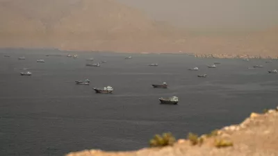 FILE PHOTO: Vessels at the Strait of Hormuz, as seen from Musandam, Oman, June 18, 2026. REUTERS/Stringer/File Photo