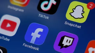 FILE PHOTO: Instagram, TikTok, Snapchat, YouTube, Facebook, Twitch and Reddit applications are displayed on a mobile phone in this picture illustration taken on December 9, 2025. REUTERS/Hollie Adams/Illustration/File Photo