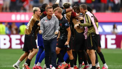Soccer Football - FIFA World Cup 2026 - Round of 32 - South Africa v Canada - Los Angeles Stadium, Inglewood, California, U.S. - June 28, 2026 Canada's Stephen Eustaquio celebrates scoring their first goal with teammates as coach Jesse Marsch reacts REUTERS/Matthew Childs