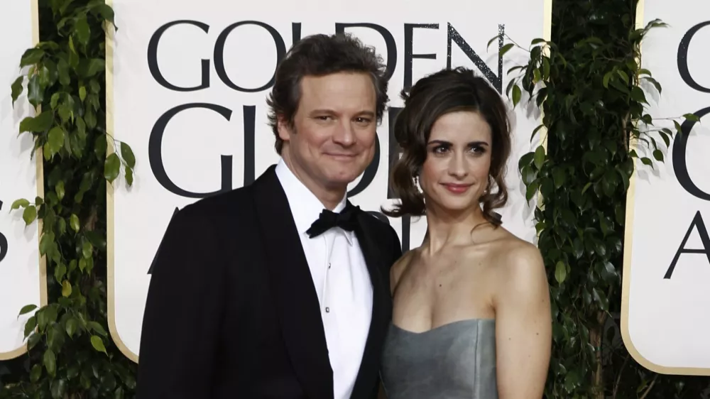 Colin Firth arrives with his wife Livia Giuggioli for the Golden Globe Awards Sunday, Jan. 16, 2011, in Beverly Hills, Calif. (AP Photo/Matt Sayles)