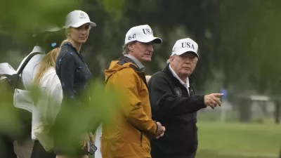 President Donald Trump, from right, Interior Secretary Doug Burgum and White House aide Natalie Harp tour the East Potomac Park golf course, Sunday, June 28, 2026, in Washington. (AP Photo/Mark Schiefelbein)