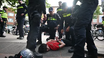 Moroccan fan celebrates after a World Cup soccer match between the Netherlands and Morocco in The Hague, Netherlands, Tuesday, June30, 2026. (AP Photo/Mouneb Taim)