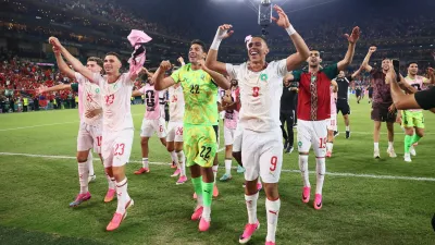 Soccer Football - FIFA World Cup 2026 - Round of 32 - Netherlands v Morocco - Estadio Monterrey, Monterrey, Mexico - June 29, 2026 Morocco's Soufiane Rahimi, Ahmed Reda Tagnaouti and teammates celebrate after the match as Morocco qualify for the Round of 16 stage of the World Cup REUTERS/Eloisa Sanchez