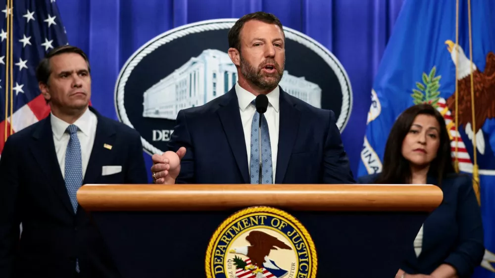 FILE PHOTO: U.S. Secretary of Homeland Security Markwayne Mullin speaks during a press conference hosted with Acting U.S. Attorney General Todd Blanche on unaccompanied minors and prosecuting their sponsors, at the Justice Department, in Washington, D.C., U.S., June 11, 2026. REUTERS/Evelyn Hockstein/File Photo
