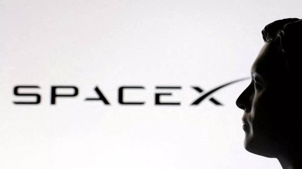 FILE PHOTO: A 3D-printed miniature model of Elon Musk and a SpaceX logo are seen in this illustration created on January 23, 2025. REUTERS/Dado Ruvic/Illustration//File Photo