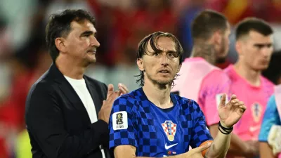 Soccer Football - FIFA World Cup 2026 - Round of 32 - Portugal v Croatia - Toronto Stadium, Toronto, Canada - July 2, 2026 Croatia's Luka Modric and coach Zlatko Dalic look dejected after the match as Croatia are eliminated from the World Cup REUTERS/Dylan Martinez