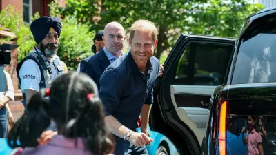 Britain's Prince Harry greets a child as he leaves the Birmingham Children's Hospital after celebrating the 20th anniversary of the first WellChild Nurse programme, in Birmingham, Britain, July 9, 2026. REUTERS/Isabel Infantes    TPX IMAGES OF THE DAY