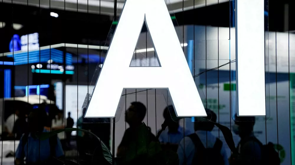 FILE PHOTO: An AI sign is seen at the World Artificial Intelligence Conference in Shanghai, China July 6, 2023. REUTERS/Aly Song/File Photo