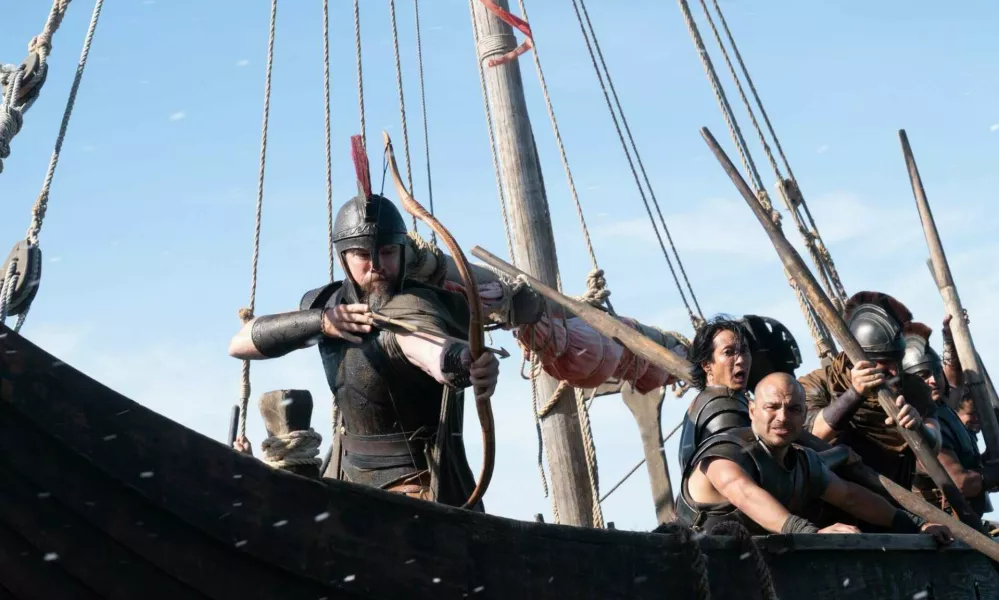 Matt Damon (frame left, with bow) is Odysseus in THE ODYSSEY, written, produced, and directed by Christopher Nolan.