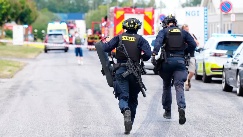 Police respond near the scene of a shooting in N&oslash;rresundby, in the North Jutland region in northern Denmark, Friday, July 17, 2026. (Henning Bagger/Ritzau Scanpix via AP)