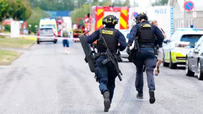 Police respond near the scene of a shooting in N&oslash;rresundby, in the North Jutland region in northern Denmark, Friday, July 17, 2026. (Henning Bagger/Ritzau Scanpix via AP)