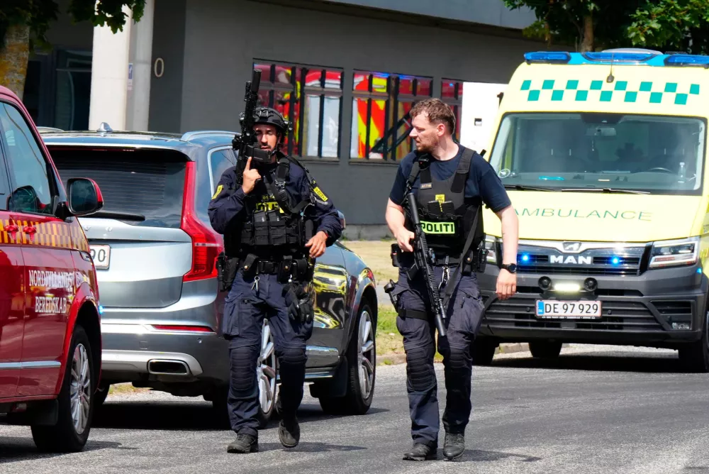 Police respond to the scene of a shooting in N&oslash;rresundby, in the North Jutland region in northern Denmark, Friday, July 17, 2026. (Henning Bagger/Ritzau Scanpix via AP)