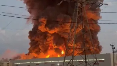 Smoke rises from a Wildberries warehouse on fire after an attack in Nevinnomyssk, Russia, July 22, 2026, in this still image obtained from social media video. Social Media/via REUTERS THIS IMAGE HAS BEEN SUPPLIED BY A THIRD PARTY. NO RESALES. NO ARCHIVES. NEWS USE ONLY.    TPX IMAGES OF THE DAY.  VERIFICATION: - Building exterior, utility poles and towers, and road layout matched archive and satellite imagery. - Corroborating footage showed smoke rising from the same location. - The governor of Stavropol region Vladimir Vladimirov said on Telegram on July 22 that a drone attack on the outskirts of Nevinnomyssk resulted in fire in a warehouse complex. - Tatyana Kim, the head and co-founder of Wildberries, posted on Telegram on July 22 that the company's logistic centers in Krasnodar and Nevinnomyssk were attacked. - No older versions of the video found posted online before July 22.