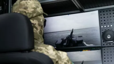 Officer of the Security Service of Ukraine operates the next-generation multipurpose Sea Baby unmanned surface vehicle, on October 17, 2025. (,Image: 1047592576, License: Rights-managed, Restrictions:, Model Release: no