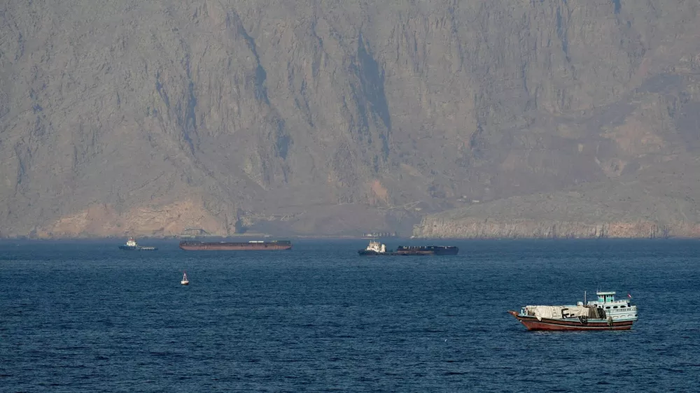 FILE PHOTO: Ships and tankers in the Strait of Hormuz off the coast of Musandam, Oman, April 18, 2026. REUTERS/Stringer//File Photo/File Photo