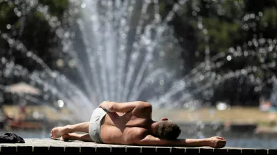 A man lies down near a fountain during a heatwave in Radom, June 27, 2026. Marcin Kucewicz/Agencja Wyborcza.pl via REUTERS ATTENTION EDITORS - THIS IMAGE WAS PROVIDED BY A THIRD PARTY. POLAND OUT. NO COMMERCIAL OR EDITORIAL SALES IN POLAND.
