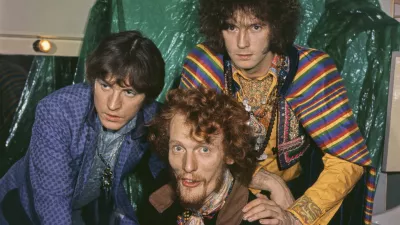British rock group Cream posed backstage in London circa May 1967. Members of the band are, from left, bassist and vocalist Jack Bruce (1943-2014), drummer Ginger Baker (1939-2019) and guitarist Eric Clapton. (Photo by Ron Howard/Popperfoto via Getty Images)