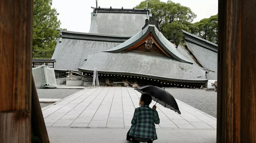 The collapsed worship hall of Yatshushiro Shrine after an earthquake with a magnitude of 7.1 struck Japan's southern Kumamoto prefecture, in Yatsushiro City, Kumamoto Prefecture, Japan, July 29, 2026. Kyodo/via REUTERS ATTENTION EDITORS - THIS IMAGE HAS BEEN SUPPLIED BY A THIRD PARTY. MANDATORY CREDIT. JAPAN OUT. NO COMMERCIAL OR EDITORIAL SALES IN JAPAN.   TPX IMAGES OF THE DAY