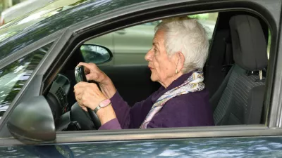 senior woman driving a car