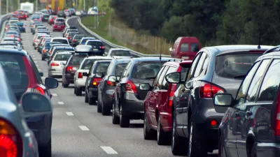 Typical scene during rush hour. A traffic jam with rows of cars. Shallow depth of field.