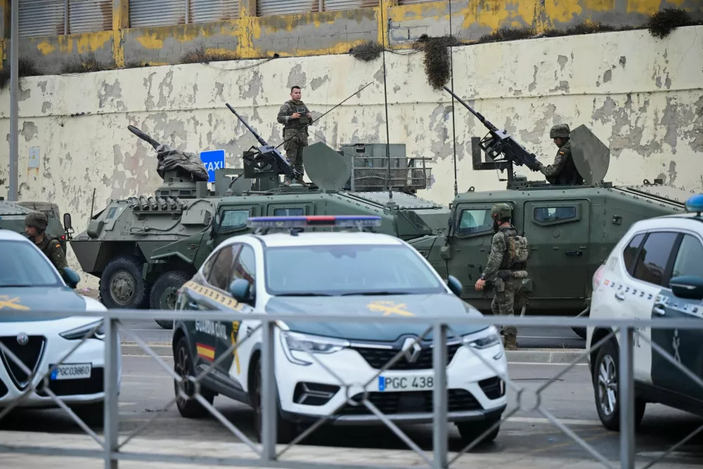 Spanish Soldiers patrol near the Spanish-Moroccan border in Ceuta, Spain, July 31, 2026, as migrants cross into Ceuta by sea and land. REUTERS/Fabian Bimmer
