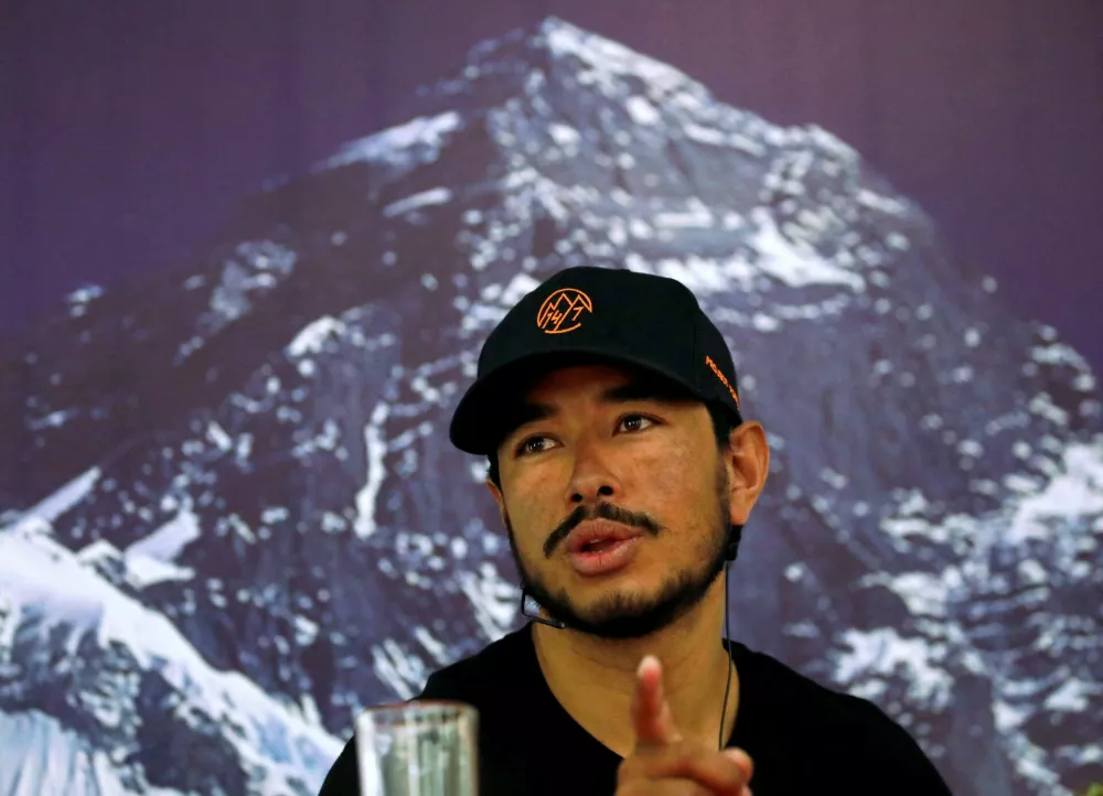 Nirmal Purja, attempting a record to climb fourteen 8000-meter mountain peaks in seven months speaks during a news conference after climbing six mountains including Mt. Everest in Kathmandu, Nepal May 28, 2019. REUTERS/Navesh Chitrakar